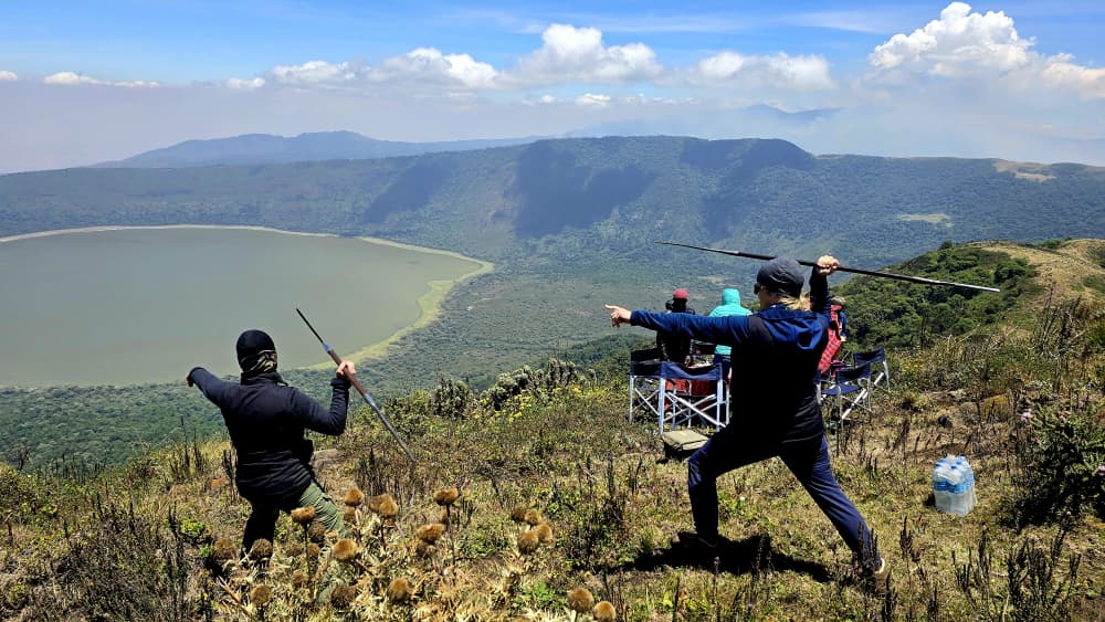 Tourists celebrating at crater rim