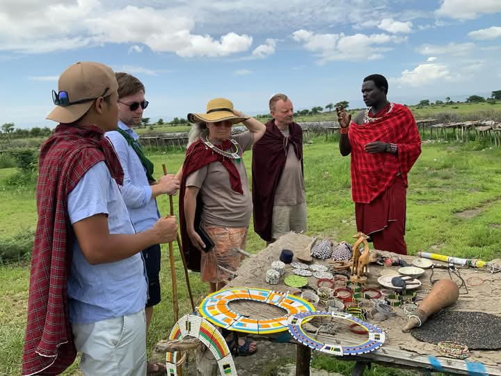 Maasai guide with traditional crafts